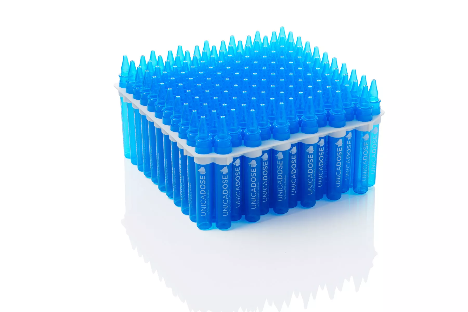A crystallizer full of transparent blue Unicadose with white marking