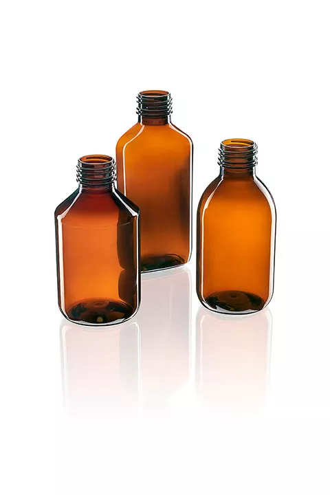 Amber PET bottles of various shapes and sizes